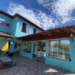 Aconchego Su&iacute;tes