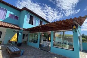 Aconchego Su&iacute;tes